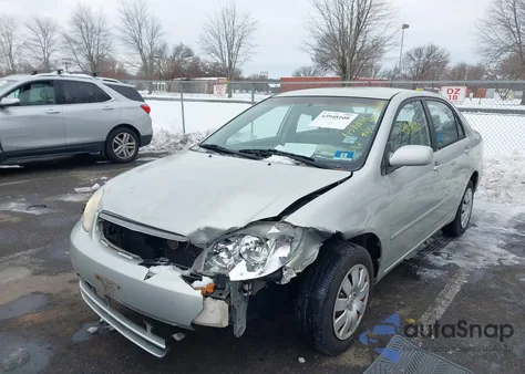 2003 Toyota Corolla Le z USA, uszkodzony, nr VIN JTDBR32EX32012593
